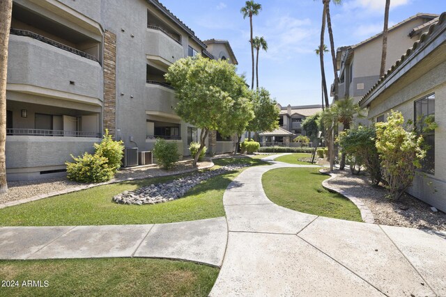 2025 E Campbell Ave Unit 260, Phoenix, AZ 85016 - view of home's community featuring a yard