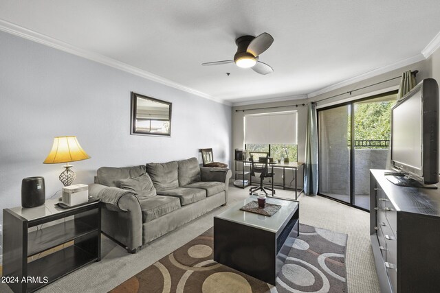 2025 E Campbell Ave Unit 260, Phoenix, AZ 85016 - carpeted living room with ornamental molding and ceiling fan