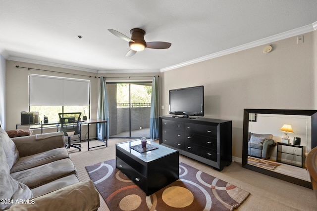 living room with crown molding, ceiling fan, and light colored carpet