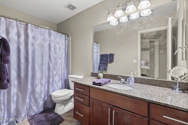 2025 E Campbell Ave Unit 260, Phoenix, AZ 85016 - bathroom with toilet, vanity, tile patterned floors, and visible vents