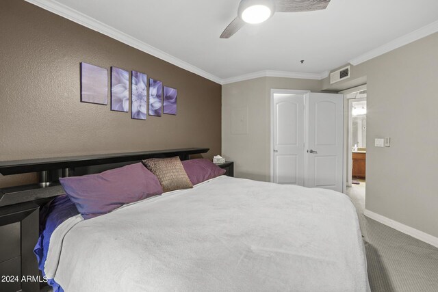 2025 E Campbell Ave Unit 260, Phoenix, AZ 85016 - bedroom with visible vents, baseboards, ornamental molding, a ceiling fan, and carpet floors