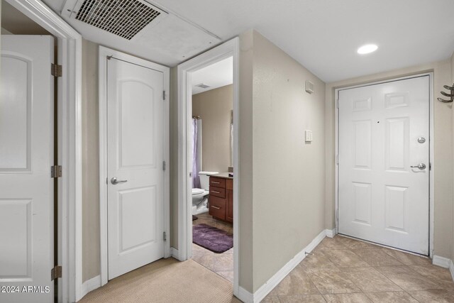 2025 E Campbell Ave Unit 260, Phoenix, AZ 85016 - corridor with baseboards and visible vents