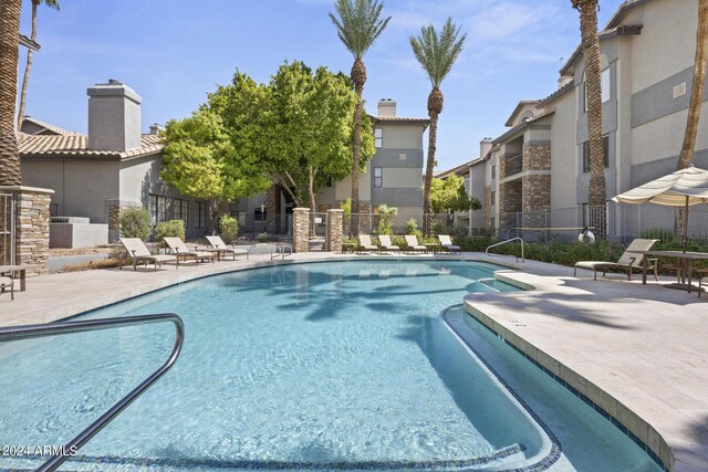 2025 E Campbell Ave Unit 260, Phoenix, AZ 85016 - pool featuring fence and a patio