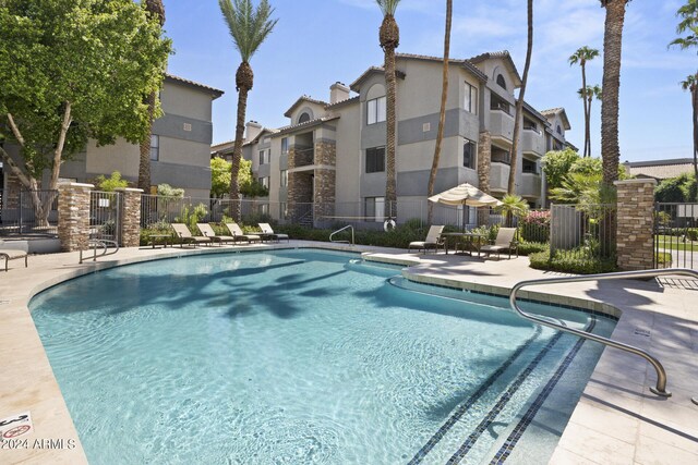 2025 E Campbell Ave Unit 260, Phoenix, AZ 85016 - community pool featuring fence and a patio area