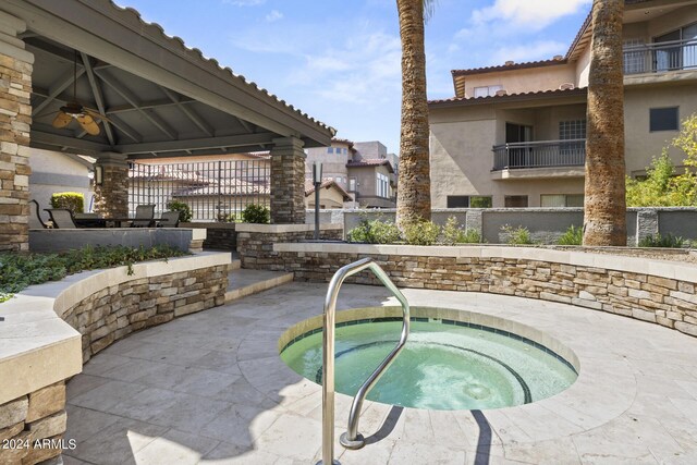 2025 E Campbell Ave Unit 260, Phoenix, AZ 85016 - view of swimming pool featuring a gazebo, a patio, and a hot tub