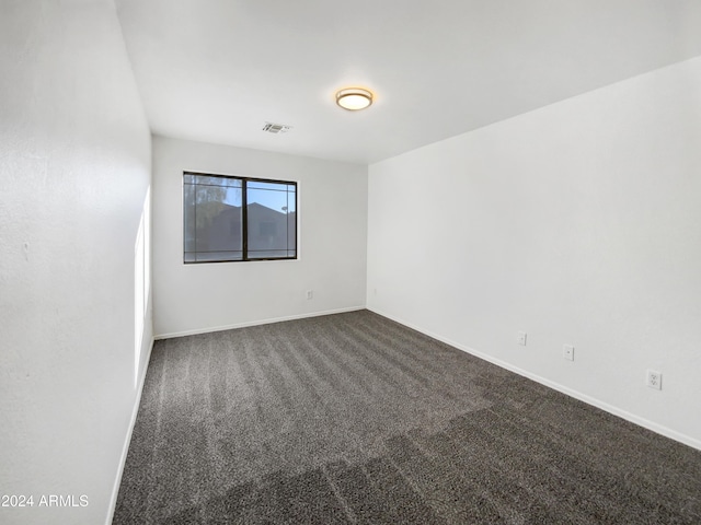 empty room featuring carpet flooring