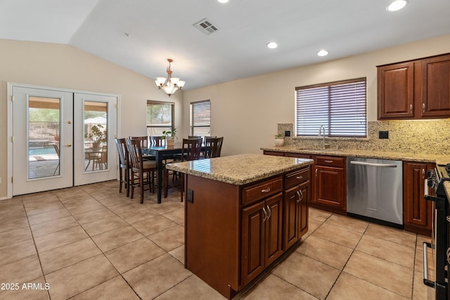 12712 W Milton Dr, Peoria, AZ 85383 - kitchen featuring appliances with stainless steel finishes, a sink, plenty of natural light, lofted ceiling, and a chandelier