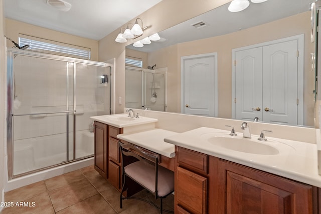 12712 W Milton Dr, Peoria, AZ 85383 - full bath featuring double vanity, a stall shower, and tile patterned flooring