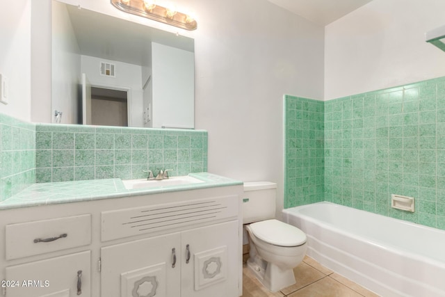 bathroom with decorative backsplash, tile patterned flooring, vanity, and toilet