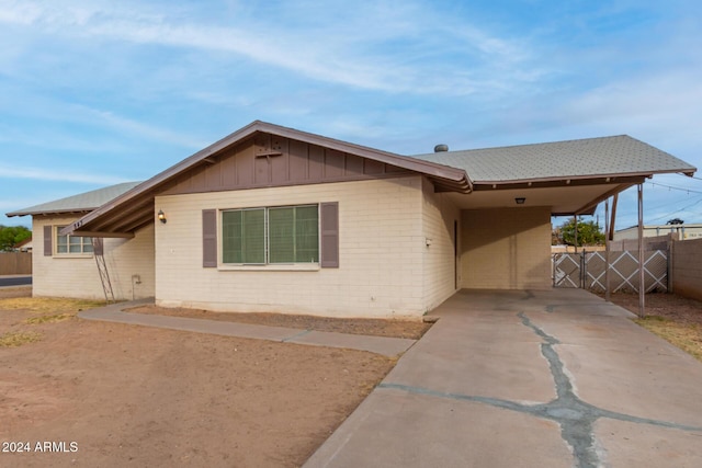 view of front of house featuring a carport