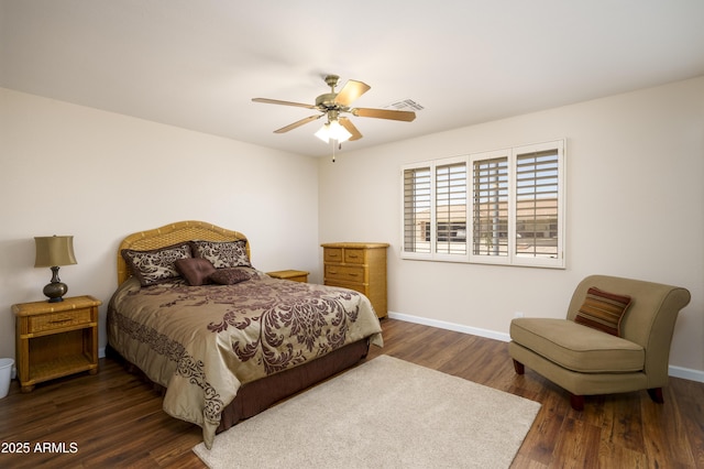 11447 E Mendoza Ave, Mesa, AZ 85209 - bedroom with baseboards, visible vents, and dark wood-style floors