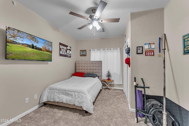 carpeted bedroom with ceiling fan