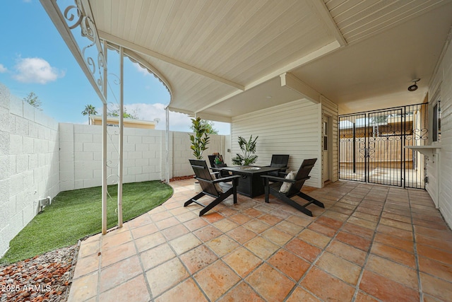 view of patio / terrace with a fenced backyard and outdoor dining space