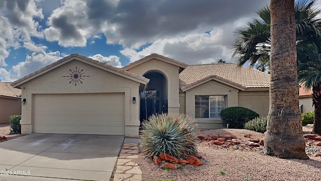 view of front of property with a garage