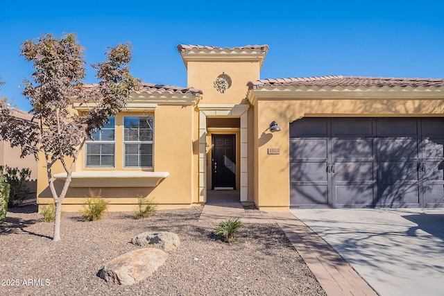 view of front of home with a garage