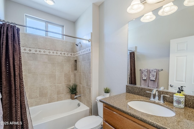 full bathroom featuring vanity, shower / tub combo, and toilet