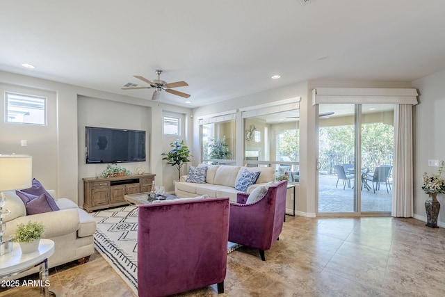 living room featuring ceiling fan