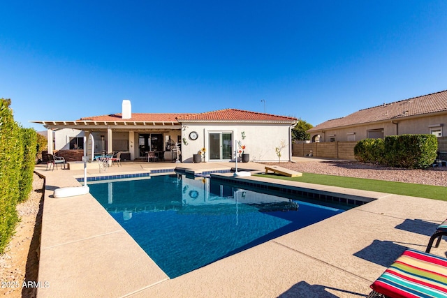 view of swimming pool featuring a patio