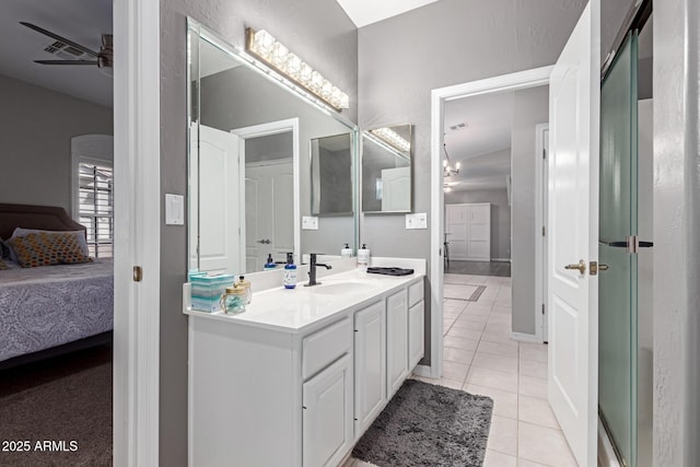 2714 N 63rd St, Mesa, AZ 85215 - bathroom featuring ceiling fan, vanity, and tile patterned flooring