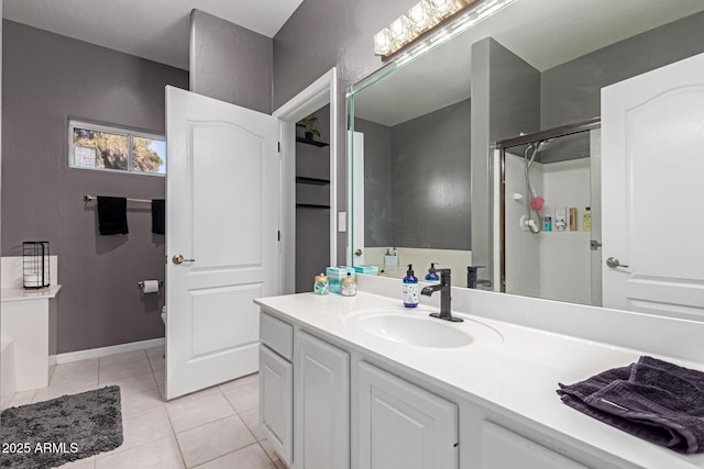 2714 N 63rd St, Mesa, AZ 85215 - bathroom featuring vanity, tile patterned floors, and a shower with door
