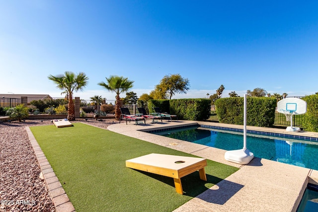 view of pool featuring a patio