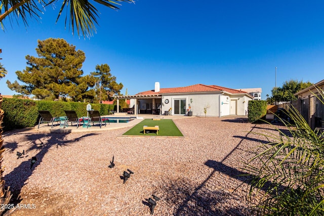 2714 N 63rd St, Mesa, AZ 85215 - rear view of property with a fenced in pool and a patio area