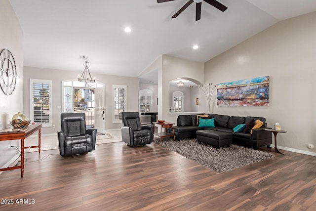 2714 N 63rd St, Mesa, AZ 85215 - living room featuring high vaulted ceiling, dark hardwood / wood-style floors, and ceiling fan with notable chandelier