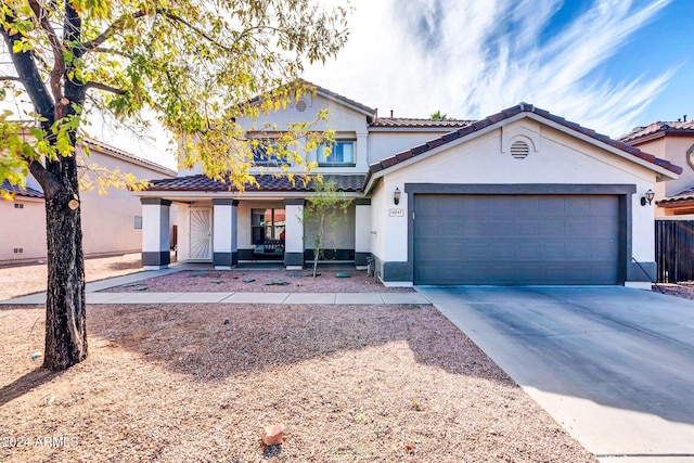 10847 E Forge Cir, Mesa, AZ 85208 - view of front of property with a porch, stucco siding, driveway, a garage, and a tile roof