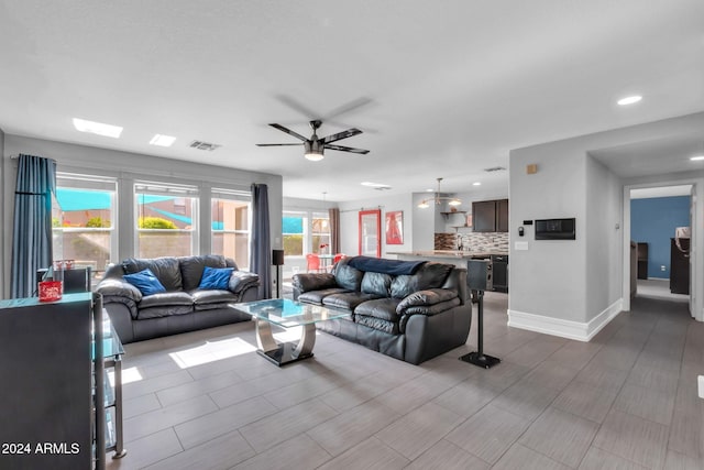 10847 E Forge Cir, Mesa, AZ 85208 - living area with a ceiling fan, baseboards, and recessed lighting