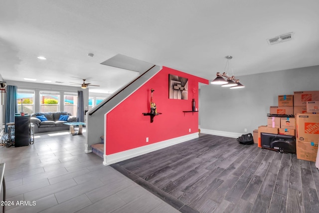 10847 E Forge Cir, Mesa, AZ 85208 - living room featuring a ceiling fan, recessed lighting, wood finished floors, baseboards, and stairs