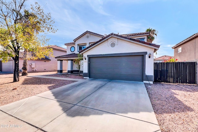 10847 E Forge Cir, Mesa, AZ 85208 - view of front of house featuring driveway, stucco siding, a garage, and a tiled roof