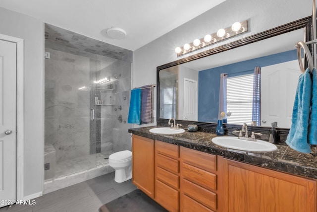 10847 E Forge Cir, Mesa, AZ 85208 - full bathroom with double vanity, a stall shower, toilet, and tile patterned flooring
