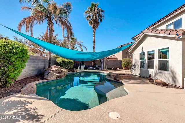 10847 E Forge Cir, Mesa, AZ 85208 - view of swimming pool featuring a fenced backyard, a patio area, and a pool with connected hot tub