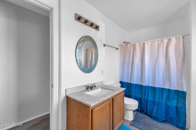 10847 E Forge Cir, Mesa, AZ 85208 - bathroom with vanity, toilet, and a shower with shower curtain