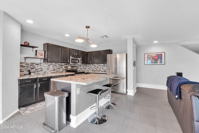 10847 E Forge Cir, Mesa, AZ 85208 - kitchen featuring appliances with stainless steel finishes, open shelves, backsplash, a sink, and recessed lighting