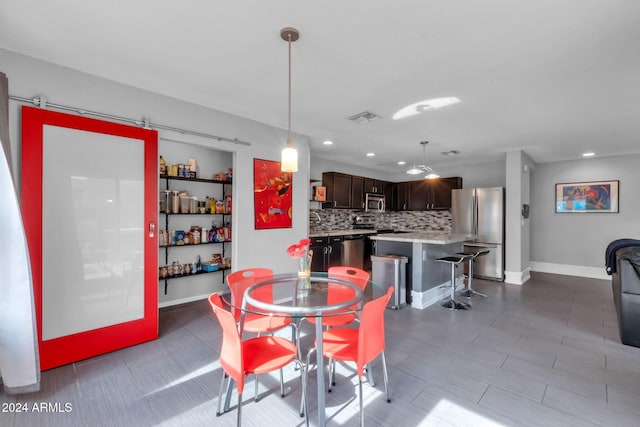10847 E Forge Cir, Mesa, AZ 85208 - dining room featuring baseboards and recessed lighting