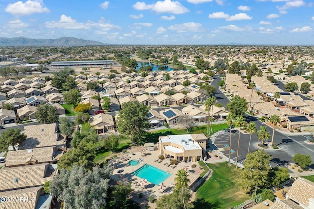 birds eye view of property featuring a mountain view and a residential view