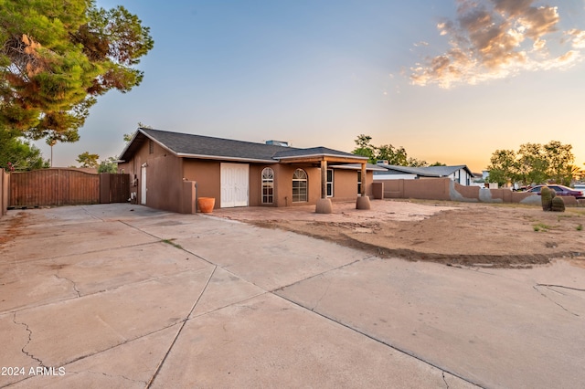 view of front of property featuring a patio area