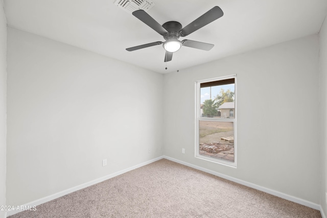 unfurnished room with ceiling fan and carpet floors