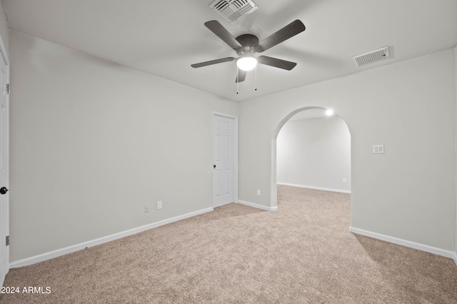 carpeted empty room with ceiling fan