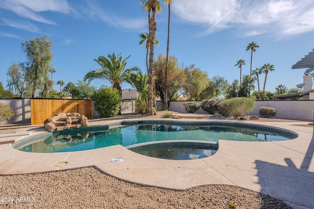 view of swimming pool with a patio