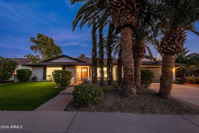 view of front of house with a lawn