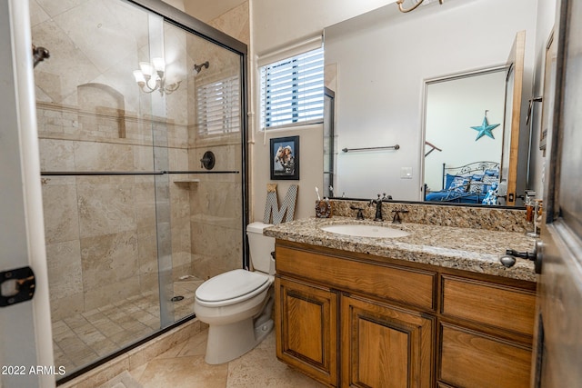 bathroom featuring vanity, an enclosed shower, tile patterned floors, and toilet