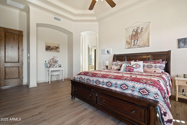 bedroom featuring ceiling fan and hardwood / wood-style floors