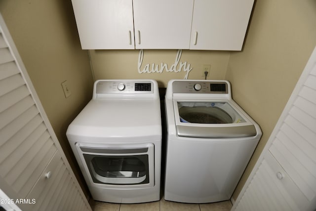 711 W El Alba Way, Chandler, AZ 85225 - laundry area featuring cabinet space, independent washer and dryer, and tile patterned floors