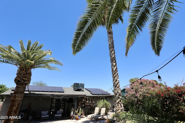 711 W El Alba Way, Chandler, AZ 85225 - exterior space featuring a patio area, central air condition unit, and roof mounted solar panels