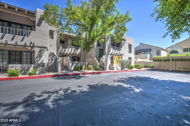 7300 N Dreamy Draw Dr Unit 202, Phoenix, AZ 85020 - view of building exterior featuring a residential view and covered parking