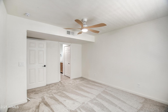 7300 N Dreamy Draw Dr Unit 202, Phoenix, AZ 85020 - unfurnished bedroom featuring light carpet, connected bathroom, and ceiling fan