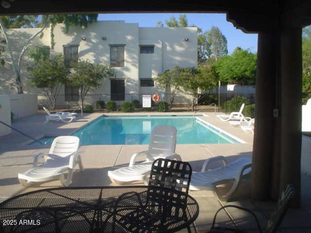 7300 N Dreamy Draw Dr Unit 202, Phoenix, AZ 85020 - community pool with a patio