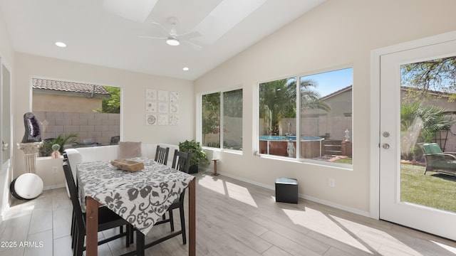 4073 E Stable Ct, Gilbert, AZ 85297 - dining space with healthy amount of natural light, vaulted ceiling, ceiling fan, recessed lighting, and baseboards
